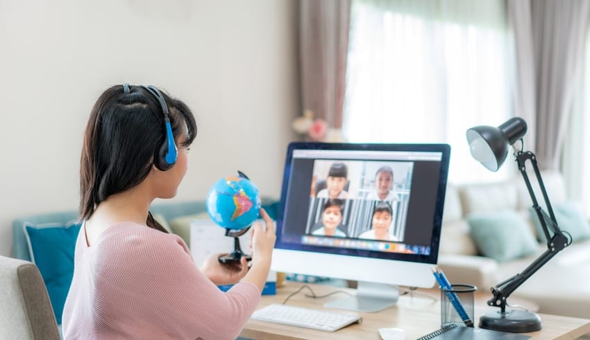 Asian Teacher teaches via video conference for Online class