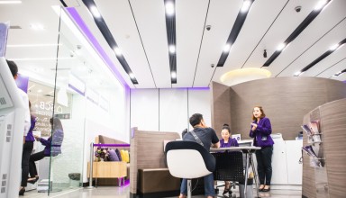 Bank employees are explaining to customers in the office at Central