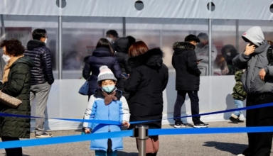 South Korea's PM warns of a COVID-19 outbreak as cases soar