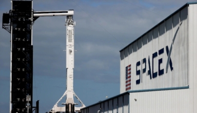 Test-fired SpaceX rocket booster catches fire