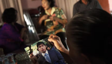 traumatized family in indonesia await news of loss