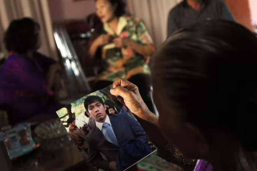 traumatized family in indonesia await news of loss
