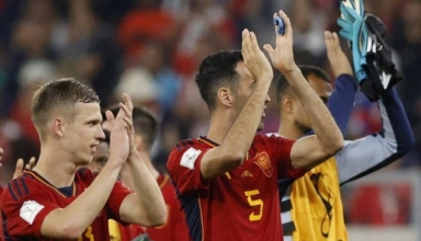 japan comes back to shock spain and the top group