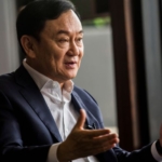thailand former pm thaksin shinawatra defers return from self exile